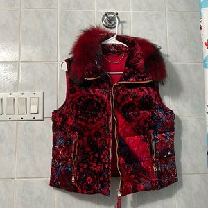 Ellie Tahari fur vest waist length, red black blue and white with a gold zipper